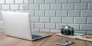 Documenting personal property for insurance using a laptop, camera, and smartphone.