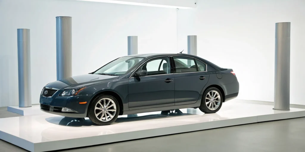 A new blue sedan on a showroom floor, a car that needs GAP insurance to cover the auto loan.